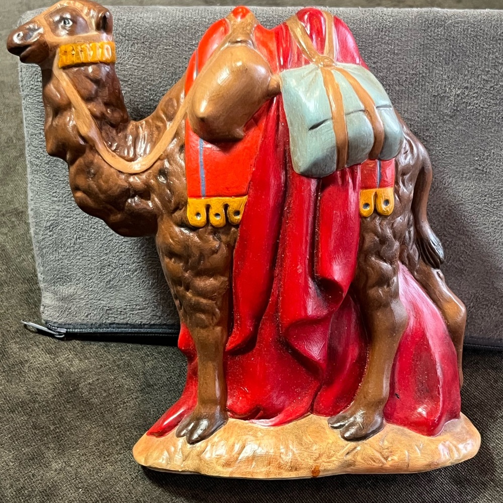 Hand painted camel with saddles and saddle packs.